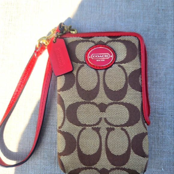 Coach Handbags - Coach Brown Signature W Red Leather North/South Wallet EUC
